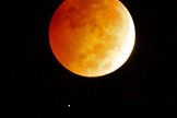Astrophotographer Greg Diesel captured this photo of the total lunar eclipse and Uranus on Oct. 8, 2014.