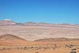 The European Extremely Large Telescope (E-ELT) will eventually stand on the summit of Cerro Armazones, which is being leveled (upper left). A new wider road to the mountain stretches across the photo. Image released Dec. 4, 2014.