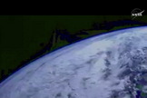 Earth's limb is seen by Orion capsule as it flies over the Earth after launch from Cape Canaveral, Florida, on Dec. 5, 2014.