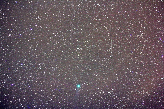 A ring of green light encircles Comet Lovejoy, in this image captured on Jan. 9, 2015, in Jadwin, Missouri. Amateur astronomer Victor Rogus used a 50mm manual focus Zeiss lens for a 36-second exposure.