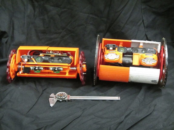 VolcanoBot 2 (left) and its larger predecessor, VolcanoBot 1, are robots built to explore nooks, crannies and fissures inside a volcano and create 3D maps of the terrain. In March, NASA will drop VolcanoBot 2 inside the maw of Hawaii's active Kilauea volcano.