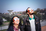Space fans watch the solar eclipse of March 20, 2015 from the European Space Agency's ESRIN Earth Observation Center in Frascati, Italy near Rome.