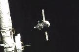 The Soyuz spacecraft carrying NASA astronaut Scott Kelly and Russian cosmonauts Mikhail Kornienko and Gennady Padalka is seen by a camera on the International Space Station during docking operations on March 27, 2015. Kelly and Kornienko are beginning a nearly 12-month mission in space.
