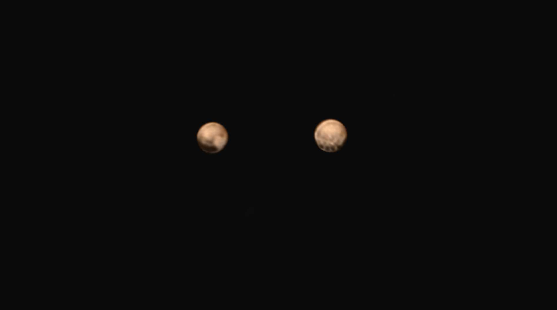 Mysterious Dark Spots on Pluto