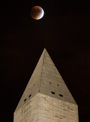 NASA photographer Aubrey Gemignani prisoner this overwhelming viewpoint of a perigee moon lunar obscure over a Washington Monument in Washington, D.C. on Sept. 27, 2015.
