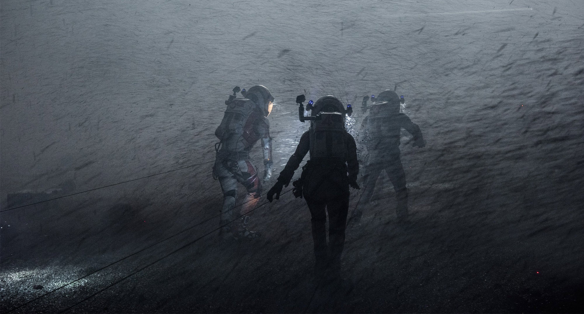 Astronauts battle their way through a fierce dust storm in the movie "The Martian."