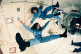 Teacher in space Christa McAuliffe (top), backup crew member Barbara Morgan (bottom) and payload specialist Greg Jarvis (back right) training in a KC-135 “vomit comet” in the 1980s.