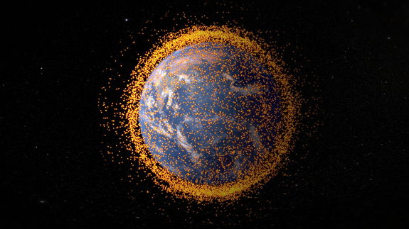 This graphic, created in 2013, shows the cloud of space junk surrounding Earth.