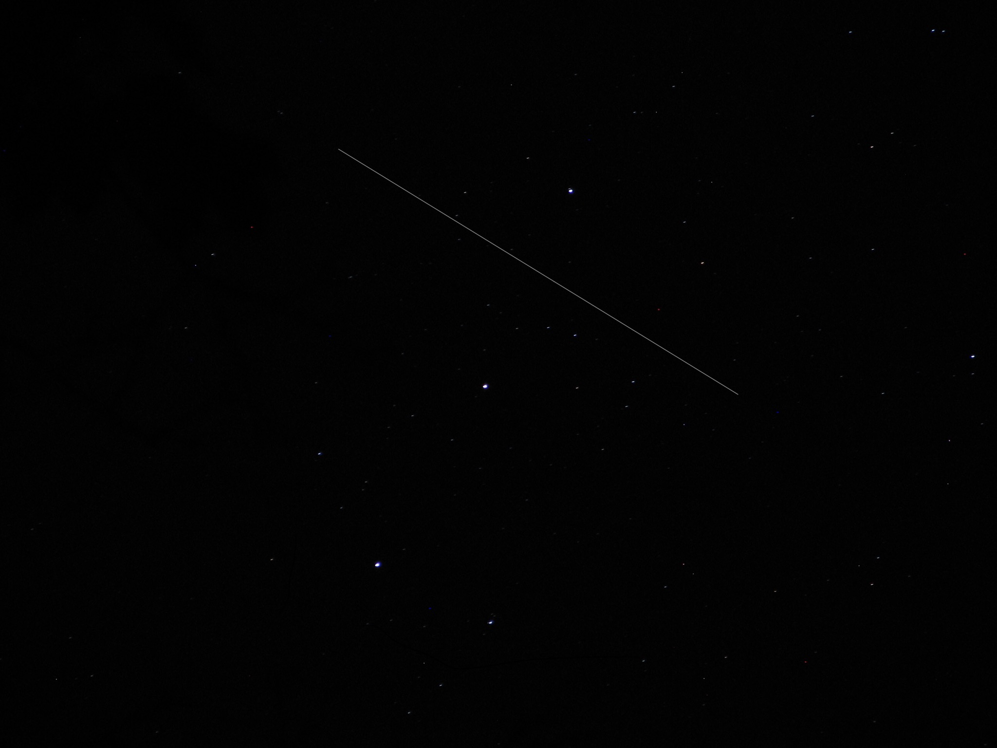 ISS Streaking Through Orion's Belt