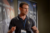 Stan Love, NASA astronaut, provided pointers for the risks and rewards of exploring Mars.