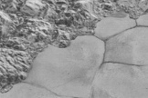 This high-resolution image from New Horizons shows the “shoreline” of Sputnik Planum on Pluto.