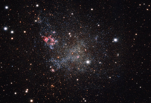 Dwarf galaxy IC 1613, as seen by the Very Large Telescope's (VLT) OmegaCam camera, showcasing its lack of cosmic dust. The VLT is part of the European Southern Observatory, located in Chile.
