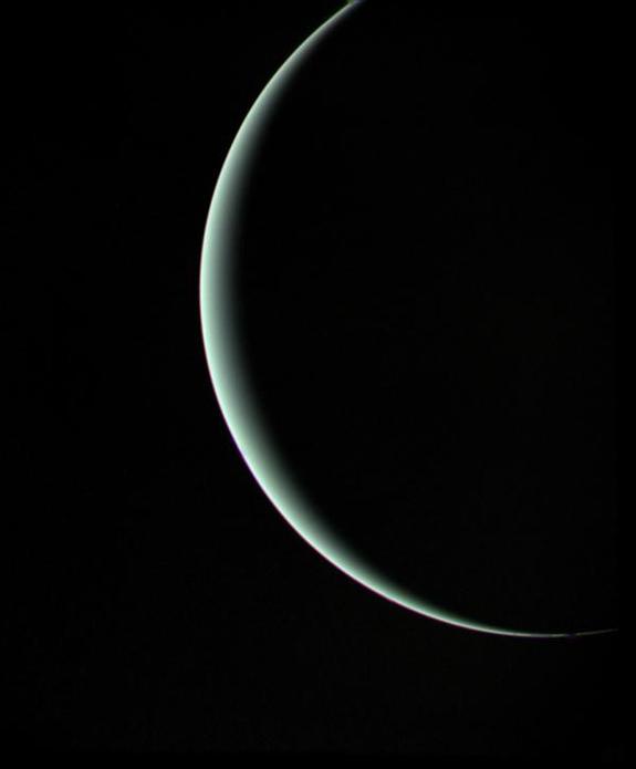 Voyager 2 captured this moody parting shot of Uranus on Jan. 24, 1986, as the spacecraft sped off toward its next adventure at Neptune. 