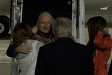 NASA astronaut Scott Kelly hugs his daughters in Houston on March 3, 2016, after coming home from a 340-day mission aboard the International Space Station.