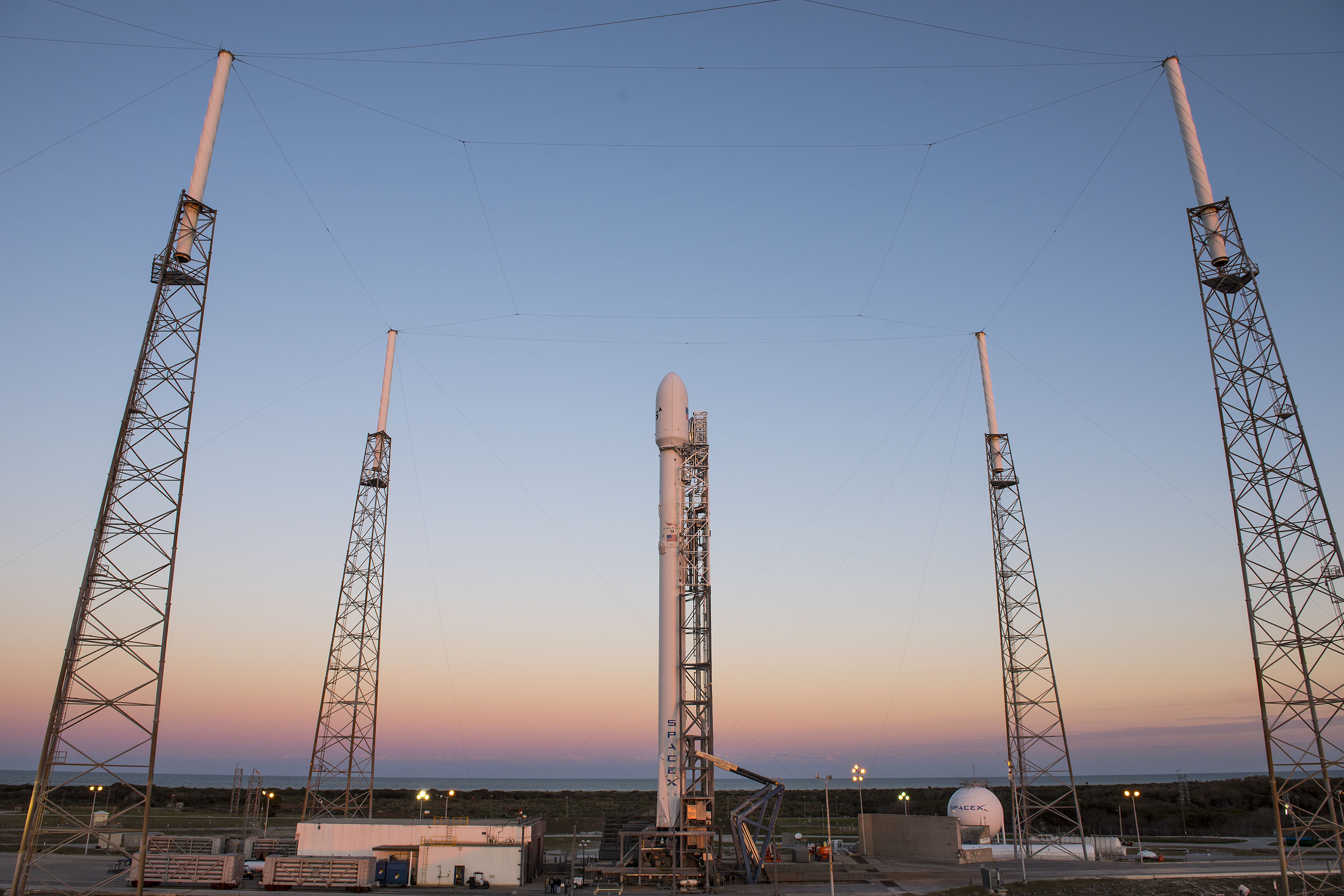 The SpaceX Falcon 9 rocket carrying the SES-9 communications satellite stands poised for its fourth launch attempt in two weeks at Florida's Cape Canaveral Air Force Station. The rocket is slated to launch Friday, March 4, at 6:35 p.m. ET, then try to lan