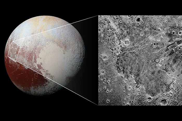 What Bit a Chunk Out of Pluto's Ice?