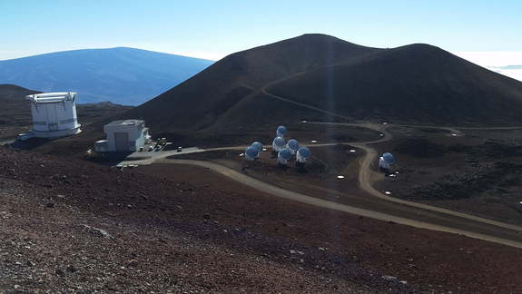 The Smithsonian Submillimeter Array is located next to Subaru. The round metal bases are places that each antennae can be moved to.