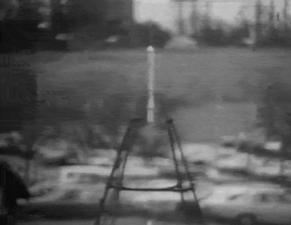 A recreation of Robert Goddard's first liquid-fueled rocket blasts off during a 1976 celebration marking the 50th anniversary of Goddard's initial launch on March 16, 1926.