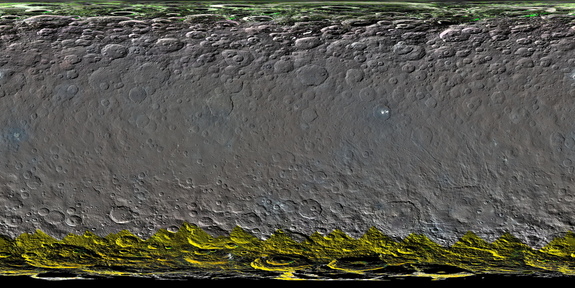 Researchers used a clear-filter mosaic to make this colorized global map of Ceres. The map had color added using spectral data from other observations of Ceres (calculated using a color transformation program). The green and yellow areas at high latitudes show where Dawn's color imaging coverage remains incomplete. Image released March 22, 2016.