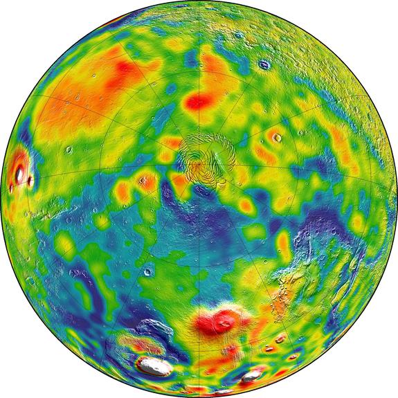 This gravity map of Mars shows the north pole of the planet (center). In this map, white and red colors denote areas of higher gravity, while blue indicates lower gravity regions.