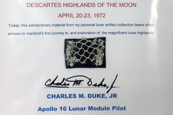 A segment of safety netting used by Apollo 16 moonwalker Charlie Duke is among the space artifacts being auctioned to support the U.S. Space Walk of Fame Museum in Florida.