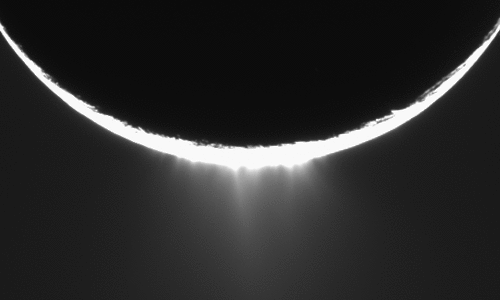 This image shows geysers erupting out of the surface of Saturn's moon Enceladus.