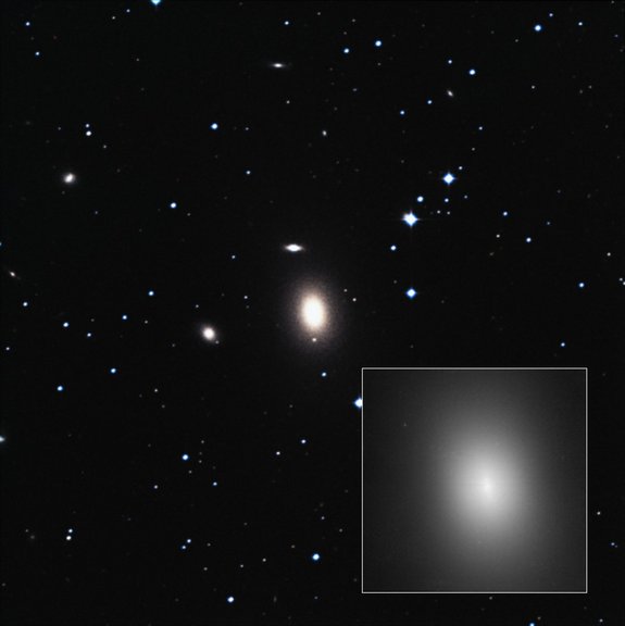 The galaxy NGC 1600 is much larger and brighter than its peers, and harbors a black hole with a mass 17 billion times that of the sun, a new study suggests. NGC 1600 is the large elliptical galaxy at this image's center, also shown in the inset.