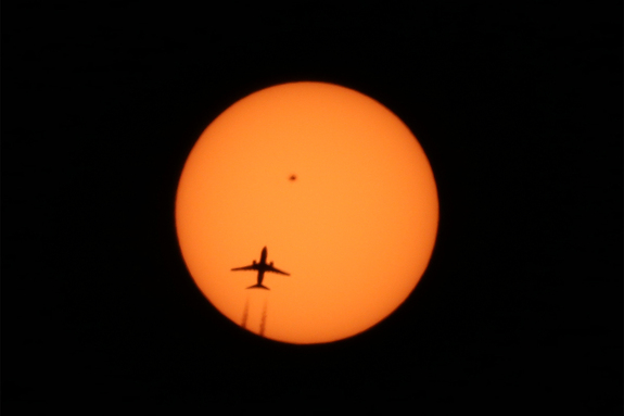 Alexander Krivenyshev of New York City captured this photo of an airplane crossing the sun's face on April 13, 2016. The heart-shaped sunspot AR 2529 is clearly visible.