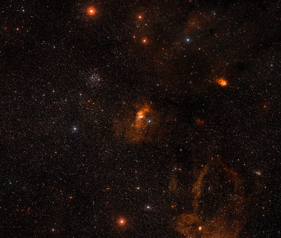 The Bubble Nebula is 8,000 light-years from Earth in the direction of the constellation Cassiopeia. This image shows the nebula (center) and its surrounding region as seen by the Hubble Space Telescope and the Digitized Sky Survey 2.