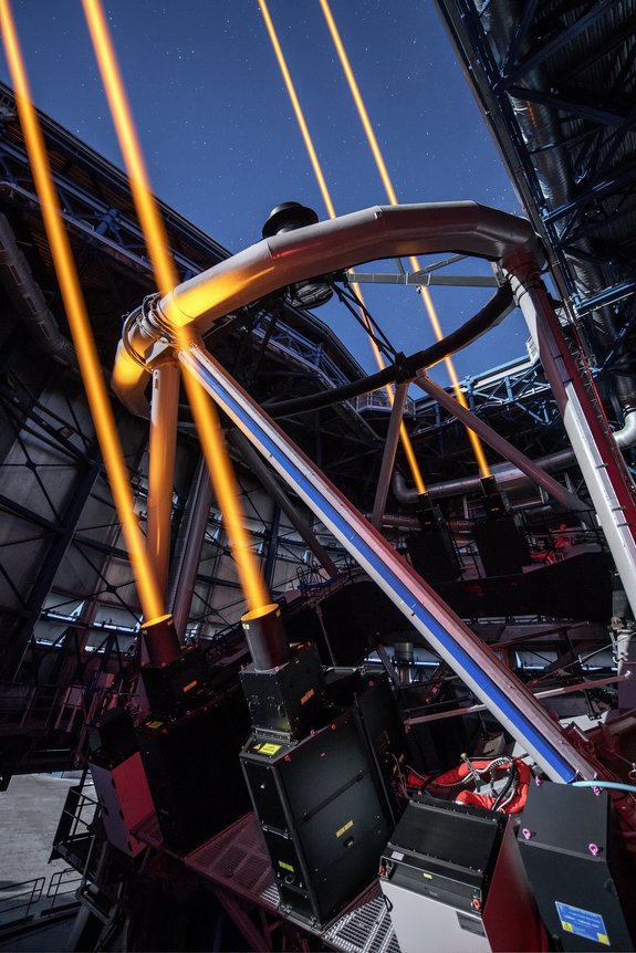 Looking more like science fiction than science, the Four Laser Guide Star Facility on the European Southern Observatory's Very Large Telescope in Chile fires its lasers into the night sky from Paranal Observatory during first light on April 26, 2016.