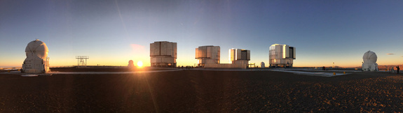 The domes of the four main telescopes and four auxiliary telescopes of the Very Large Telescope commence opening ahead of a night's observing on May 9 during the #MeetESO social media event. Click for high-resolution version.