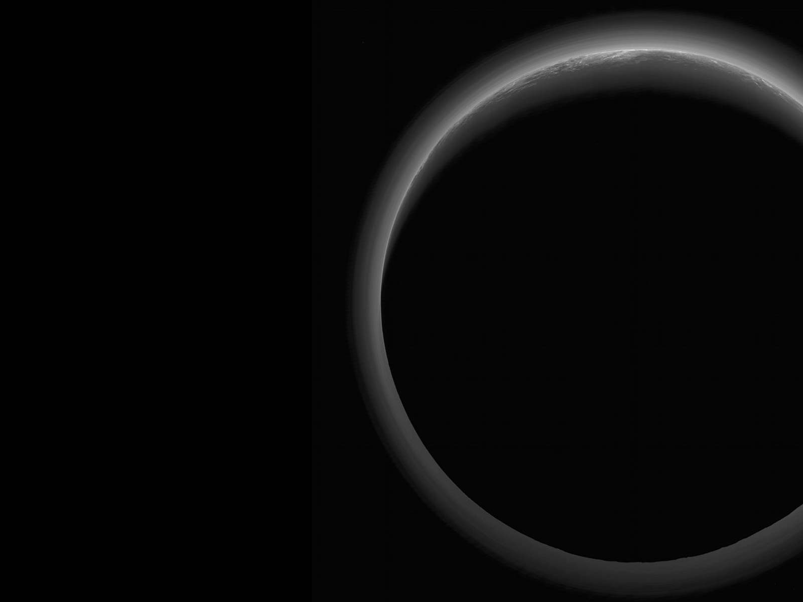 Darkness on a Dwarf Planet | Space Wallpaper