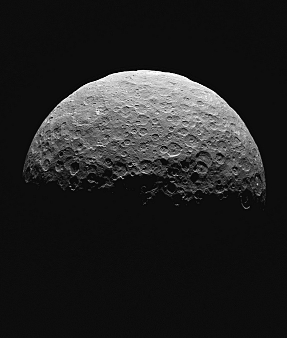 Ceres appears to rise from the depths of space in this image taken by NASA's Dawn spacecraft.