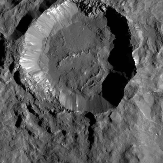 Kupalo Crater, one of the youngest craters on Ceres, shows evidence of salts (the bright materials on its rim and walls). Image taken by the Dawn spacecraft. 