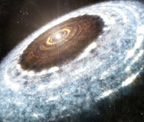 An artist's illustration shows the water snow line spotted around the young star V883 Orionis — the delineation between where the hot star vaporizes all water, leaving rocky dust and debris, and where ice and snow exist in the disk.