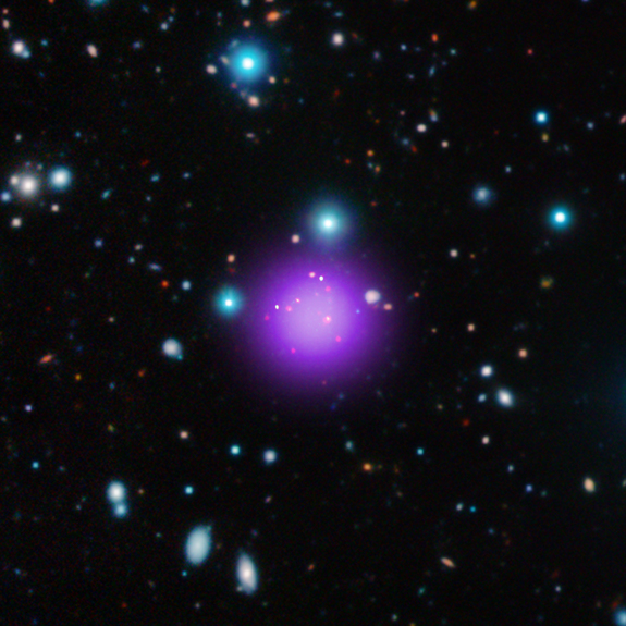 Galaxy cluster CL J1001+0220 is the most distant cluster ever discovered. This image is a composite of X-ray, infrared and radio observations from several telescopes. 