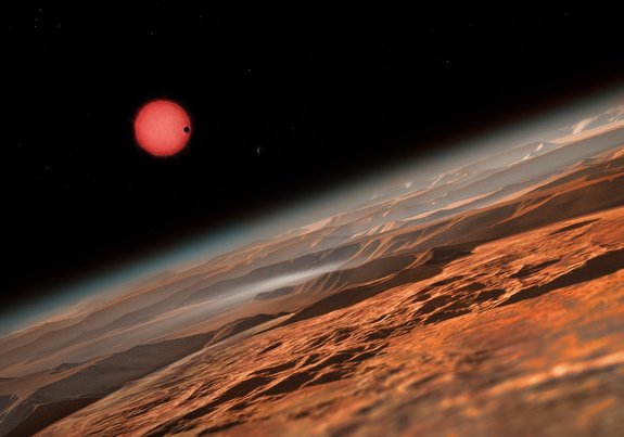 A star system known as TRAPPIST-1 has three potentially Earth-like planets in its orbit. This is an artist's impression of the TRAPPIST-1 star system as seen from one of the three alien planets.