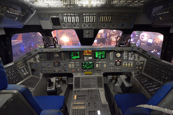 Space Center Houston's mock space shuttle Adventure features a walkthrough interior crew cabin, including the forward flight deck pictured here, reproducing the commander and pilot stations.