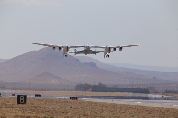 Virgin Galactic's VSS Unity space plane and its carrier plane, the Virgin Mothership Eve, take off on their first captive carry flight from the Mojave Air and Space Port in California on Sept. 8, 2016.