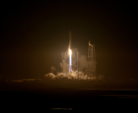 An upgraded Orbital ATK Antares rocket soars into the night sky over NASA's Wallops Flight Facility on Wallops Island, Virginia on Oct. 17, 2016, beginning a Cygnus cargo delivery mission to the International Space Station for NASA. It was Orbital ATK's first Antares rocket launch since a 2014 accident.