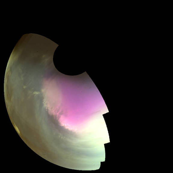 This ultraviolet image near Mars’ South Pole was taken by MAVEN on July 10 2016 and shows the atmosphere and surface during southern spring. The ultraviolet colors of the planet have been rendered in false color, to show what we would see with ultraviolet-sensitive eyes. Darker regions show the planet's rocky surface and brighter regions are due to clouds, dust and haze. The white region centered on the pole is frozen carbon dioxide (dry ice) on the surface. Pockets of ice are left inside craters as the polar cap recedes in the spring, giving its edge a rough appearance. High concentrations of atmospheric ozone appear magenta in color, and the wavy edge of the enhanced ozone region highlights wind patterns around the pole.