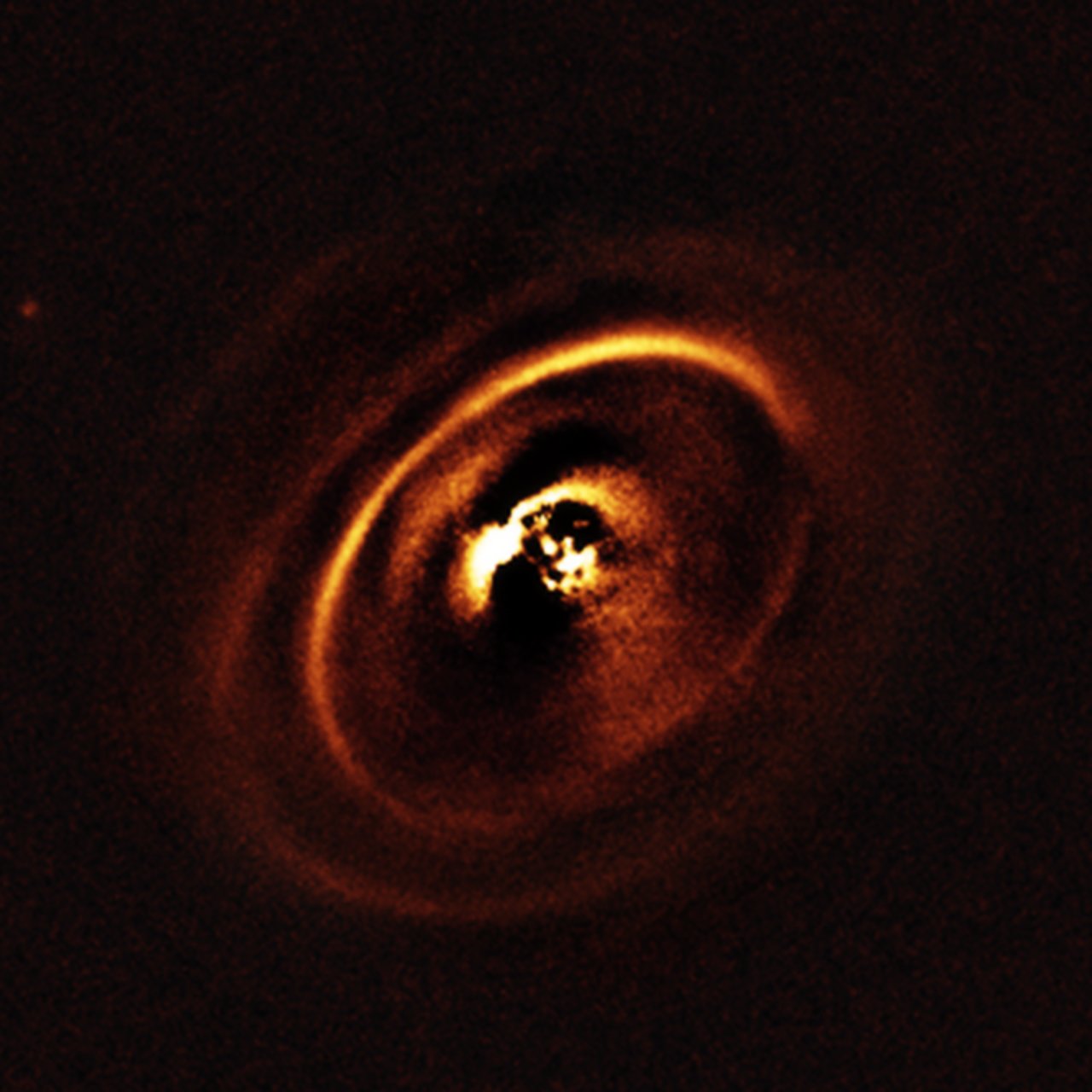 Swirls of Planet Birth Revealed with ESO's Very Large Telescope (Photos)
