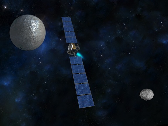 Artist’s concept of NASA's Dawn spacecraft traveling from the giant protoplanet Vesta (in a Dawn photo at lower right) to dwarf planet Ceres (upper left). 