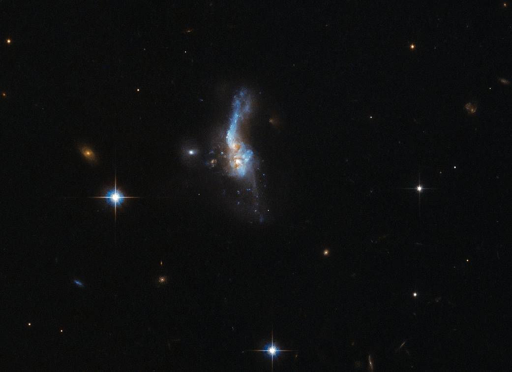 Beautiful Galaxy Collision Captured by Hubble Telescope