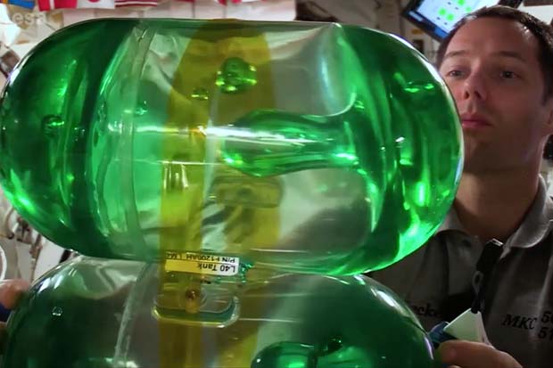 Astronaut 'Sloshes' Fluids In Space For Experiment | Video