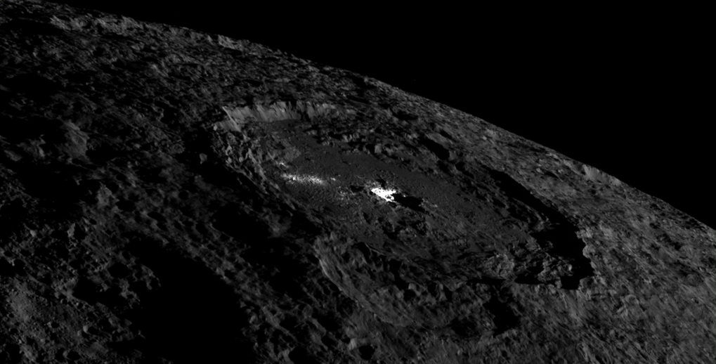Briny Ice Oozes in Dwarf Planet Ceres' Ice Volcanoes