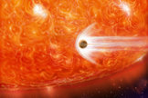 This artist's impression shows a red giant engulfing a Jupiter-like planet as it expands.