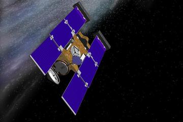 An artist's concept of the Stardust spacecraft beginning its flight through gas and dust around comet Wild 2.