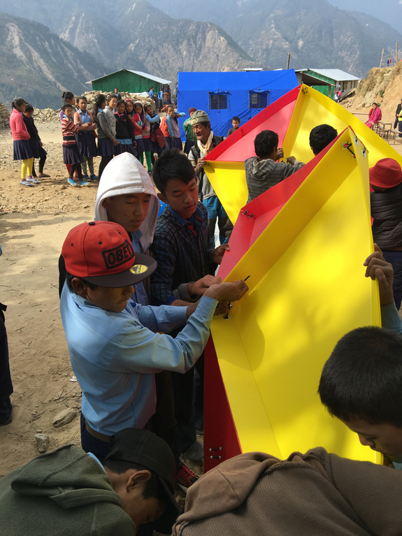 Schoolkids construct the dome by themselves at Sindupalchok, Nepal.